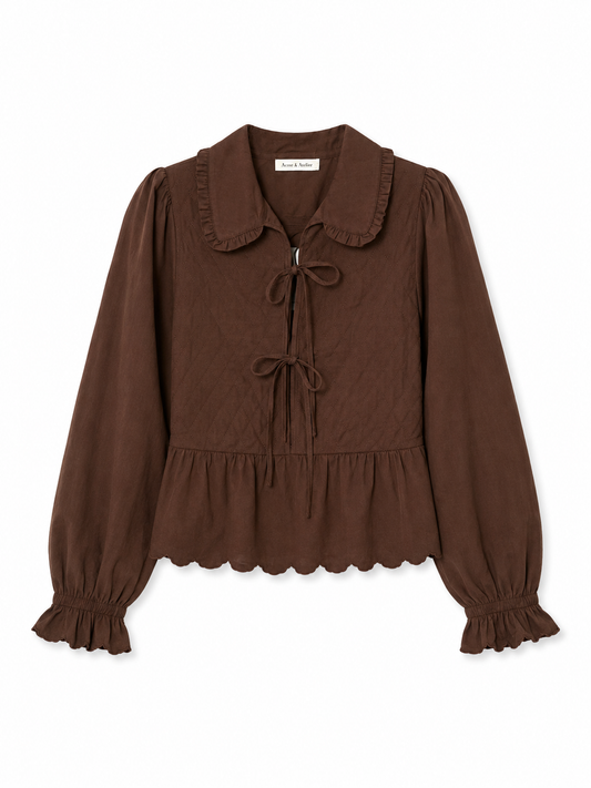 Blusa peplum con lazos