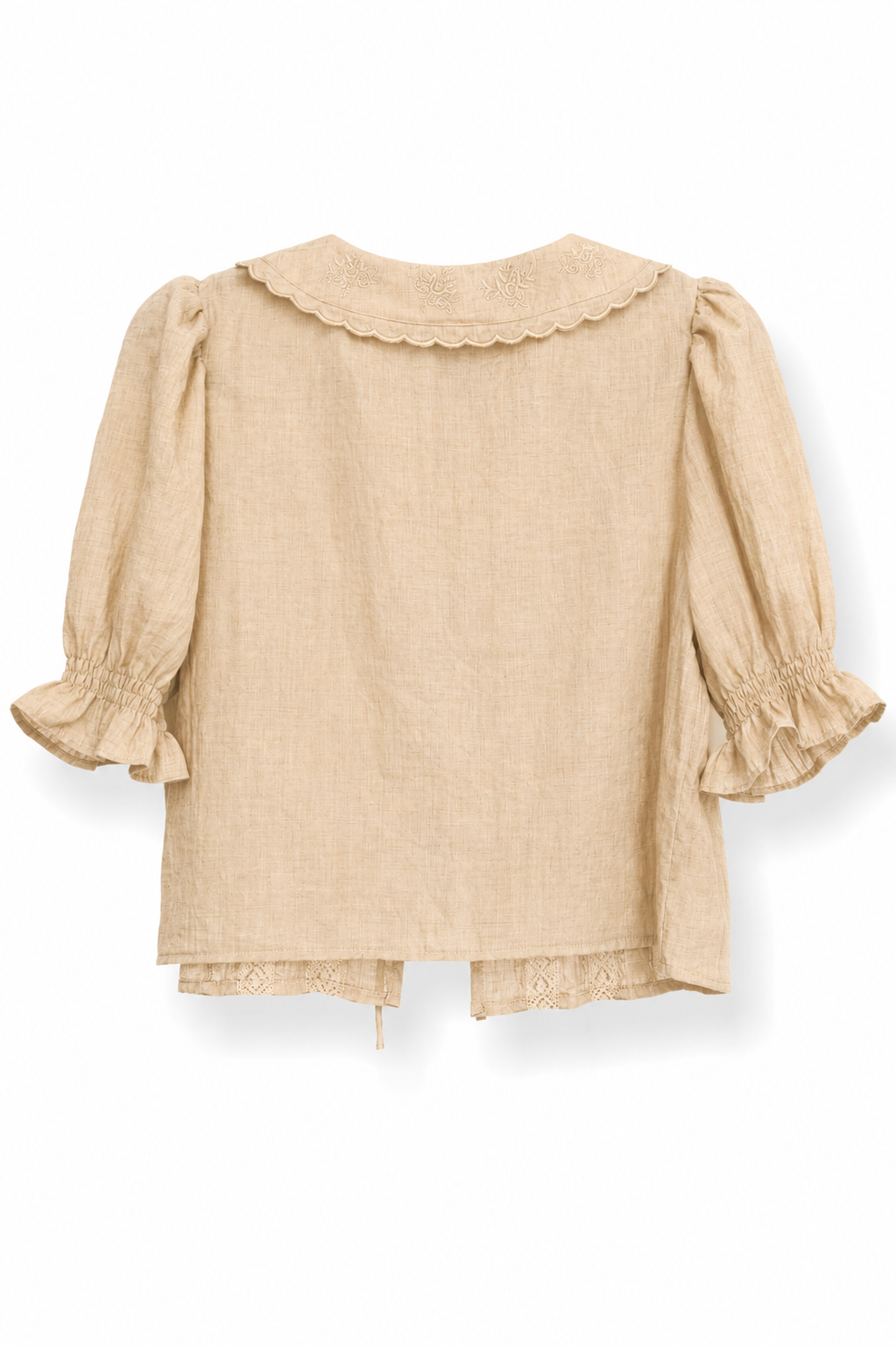 Blusa beige con cuello bordado